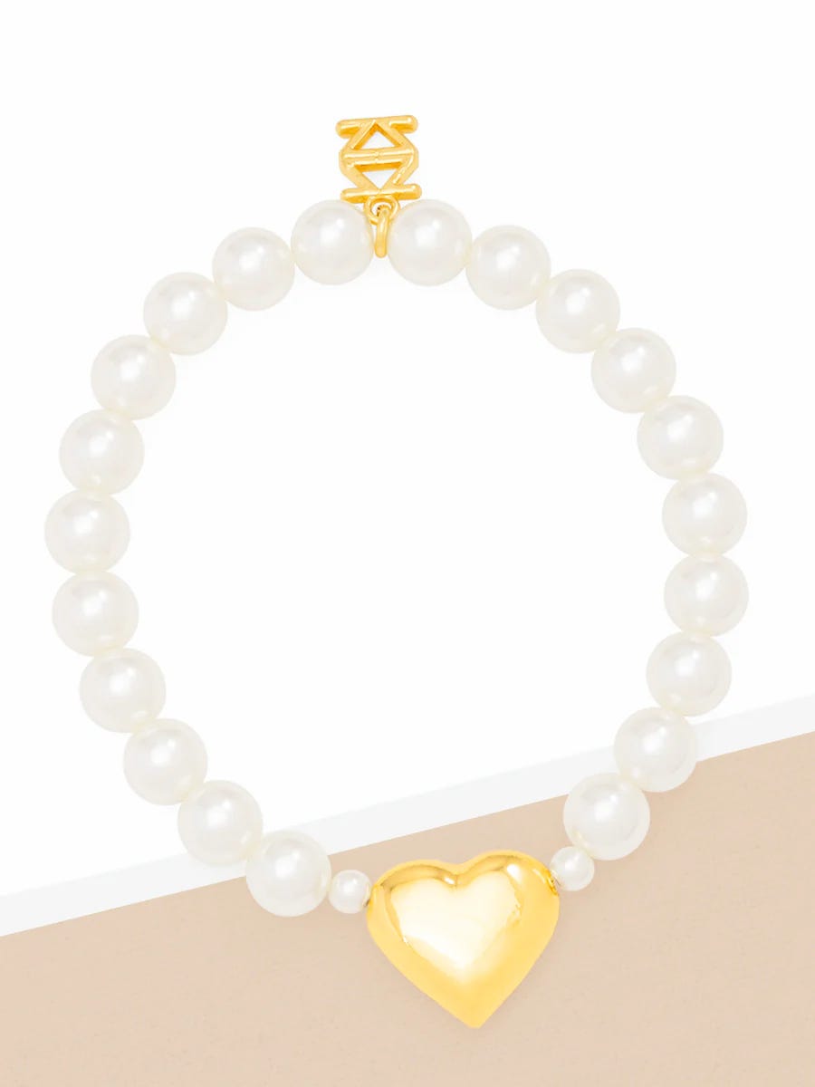 Pearl bracelet with gold heart charm